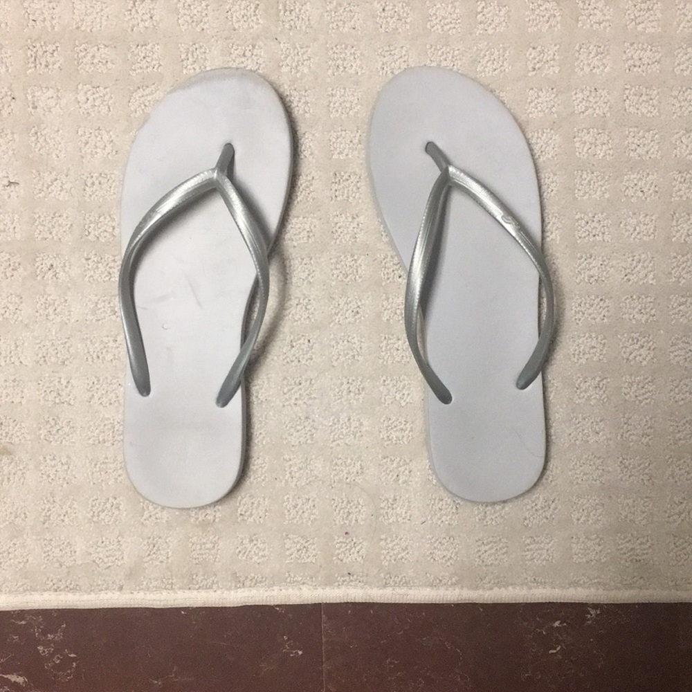 Grey Hollister flip flops